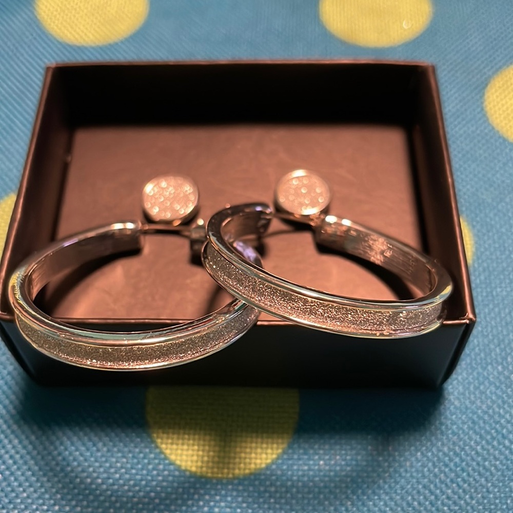 Avon pretty as a diamond 2 pair earring set.
